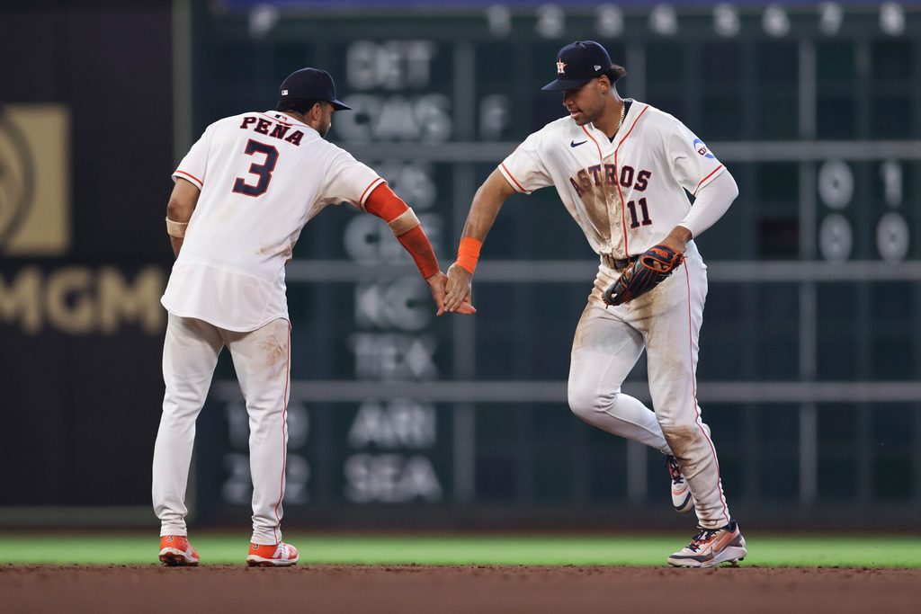May 30, 2026; Houston, Texas, USA; Houston Astros shortstop Jeremy Pena (3) and right fielder Cam Smith (11) celebrate after the game against the Milwaukee Brewers at Daikin Park. Mandatory Credit: Troy Taormina-Imagn Images