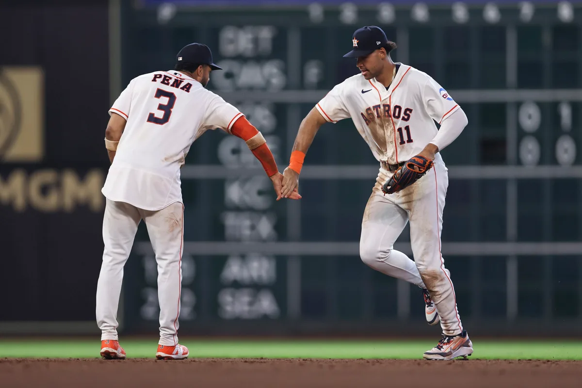 May 30, 2026; Houston, Texas, USA; Houston Astros shortstop Jeremy Pena (3) and right fielder Cam Smith (11) celebrate after the game against the Milwaukee Brewers at Daikin Park. Mandatory Credit: Troy Taormina-Imagn Images