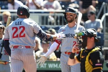 May 31, 2026; Pittsburgh, Pennsylvania, USA;  Minnesota Twins center fielder Kody Clemens (right) greets third baseman Brooks Lee (22) crossing home plate on a solo home run which was his second home run of the game during the ninth inning against the Pittsburgh Pirates at PNC Park. Mandatory Credit: Charles LeClaire-Imagn Images