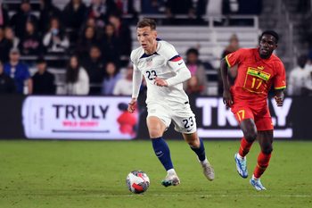 Oct 17, 2023; Nashville, Tennessee, USA; United States defender Kristoffer Lund (23) dribbles into the offensive zone during the second half against Ghana at GEODIS Park. Mandatory Credit: Christopher Hanewinckel-Imagn Images