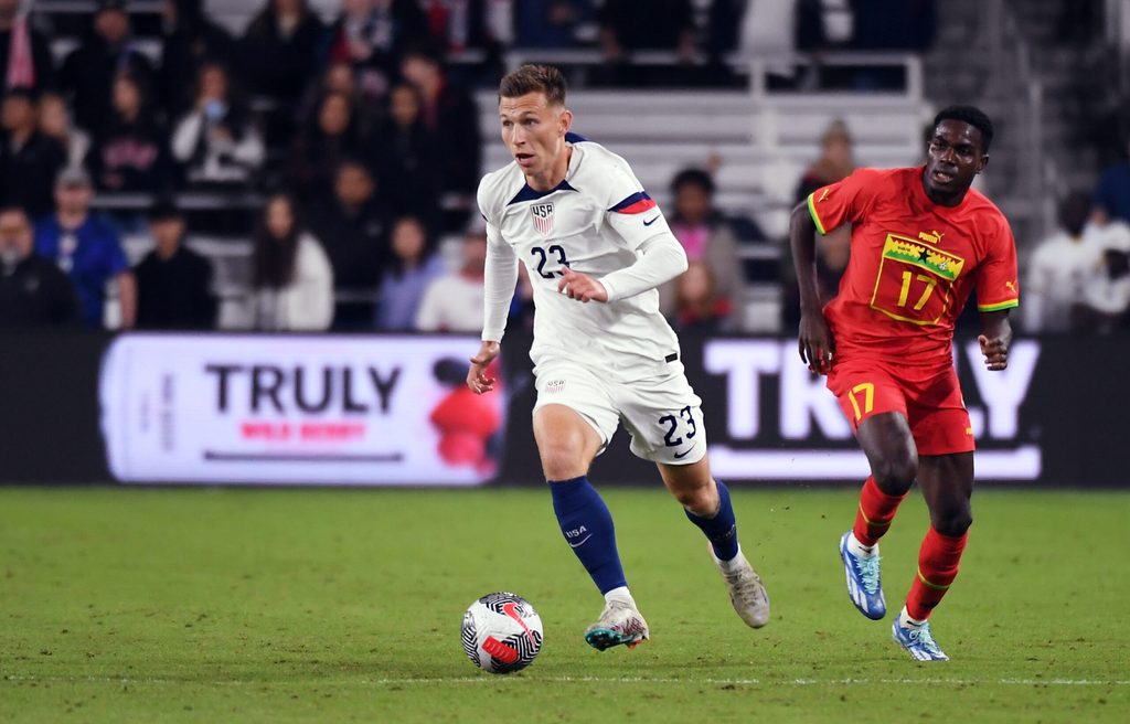 Oct 17, 2023; Nashville, Tennessee, USA; United States defender Kristoffer Lund (23) dribbles into the offensive zone during the second half against Ghana at GEODIS Park. Mandatory Credit: Christopher Hanewinckel-Imagn Images