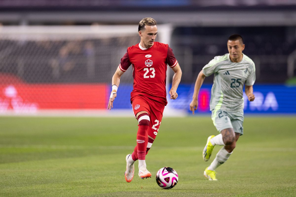 Sep 10, 2024; Arlington, TX, USA; Canada midfielder Liam Millar (23) dribbles the ball against Mexico in the first half at AT&T Stadium. Mandatory Credit: Brett Patzke-Imagn Images