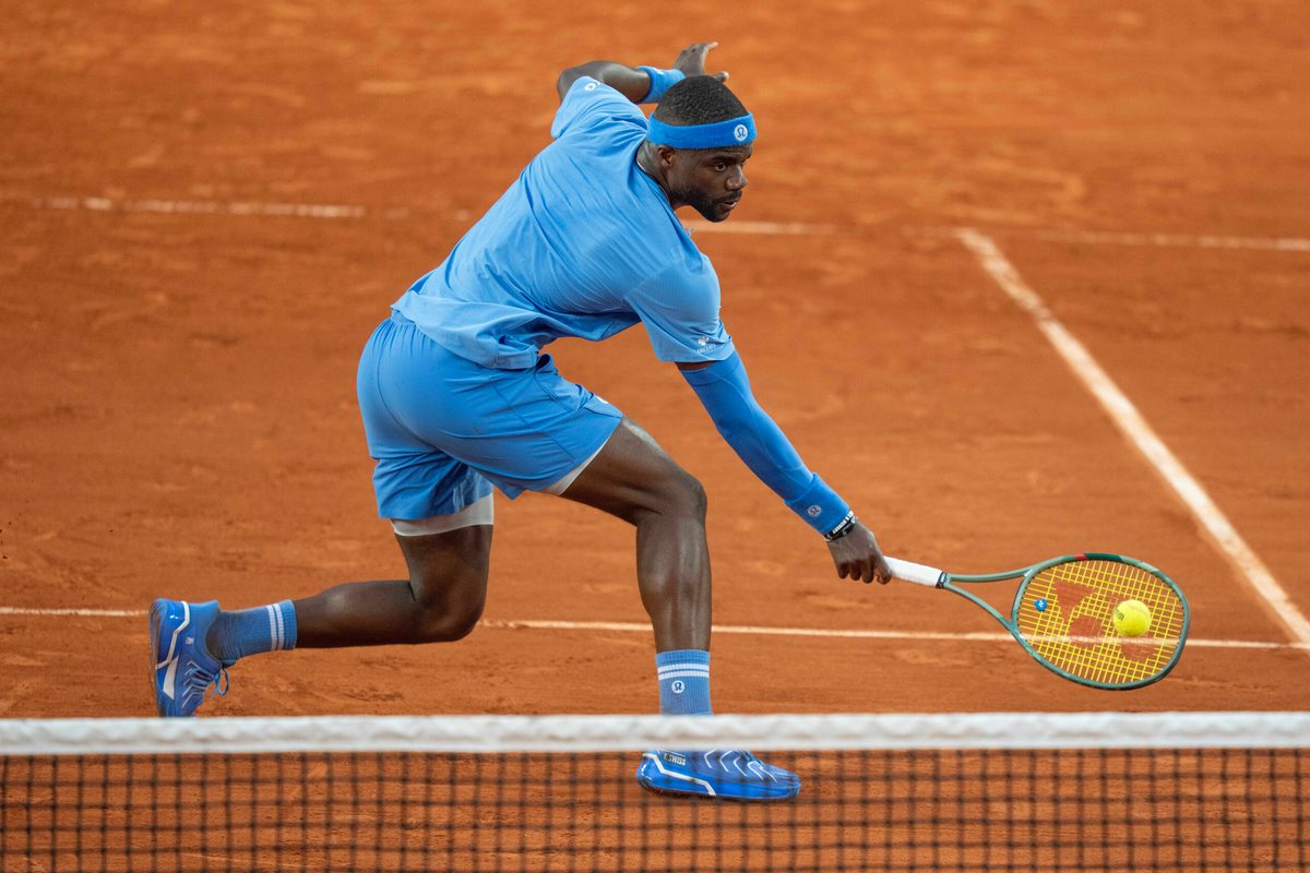 Jun 1, 2025; Paris, FR; Frances Tiafoe of the United States returns a shot during his match against Daniel Altmaier of Germany on day eight at Roland Garros Stadium.  Mandatory Credit: Susan Mullane-Imagn Images