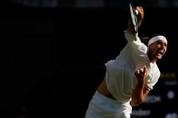 Jul 1, 2025; Wimbledon, United Kingdom; Alexander Zverev (GER) serves against Arthur Rinderknech (FRA)(not pictured) on day 2 of The Championships, Wimbledon 2025 at All England Lawn Tennis and Croquet Club. Mandatory Credit: Geoff Burke-Imagn Images
