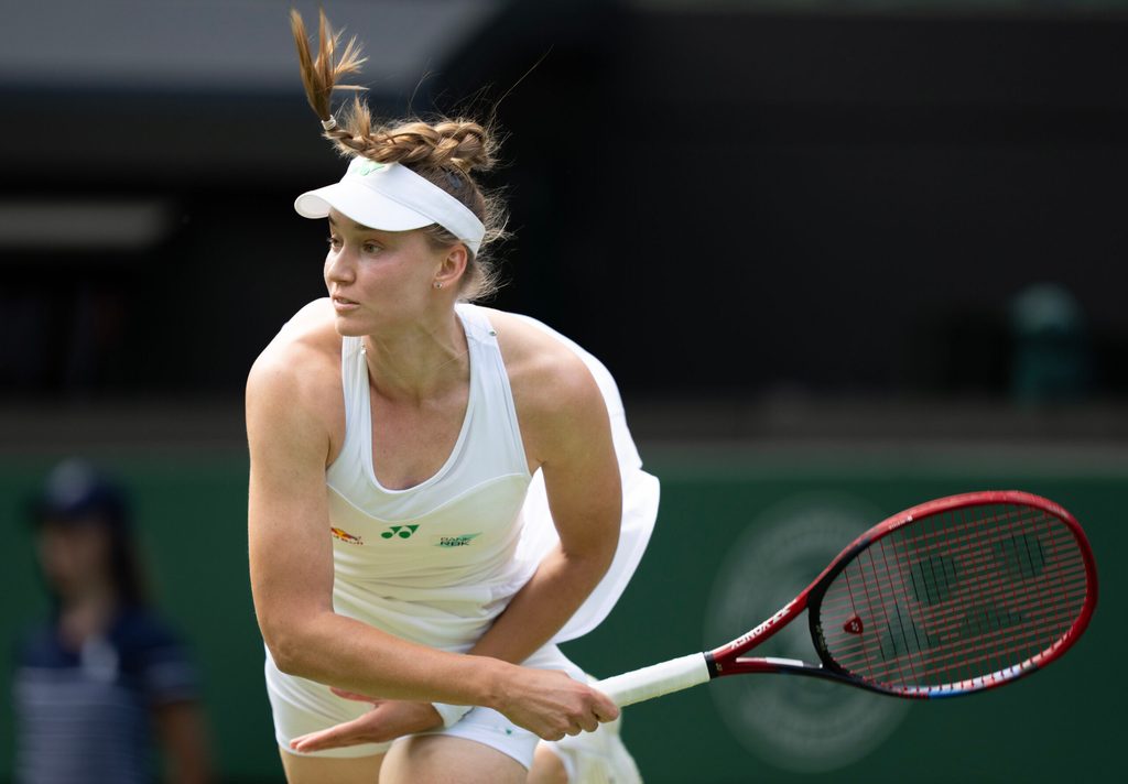 Jul 3, 2025; Wimbledon, United Kingdom; Elena Rybakina of Kazakhstan serves during her match against Maria Sakkari of Greece on day four at the All England Lawn Tennis and Croquet Club. Mandatory Credit: Susan Mullane-Imagn Images