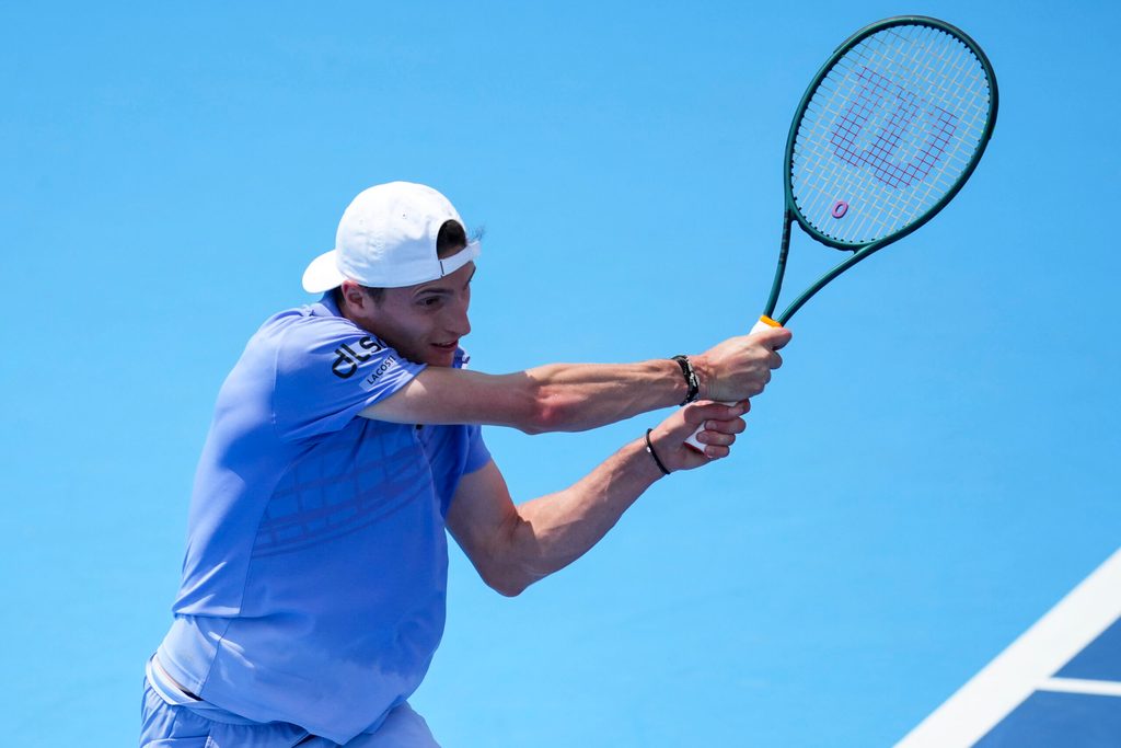 Aug 11, 2025; Cincinnati, OH, USA; Ugo Humbert (FRA) returns a shot against Frances Tiafoe (USA) during the Cincinnati Open at the Lindner Family Tennis Center. Mandatory Credit: Aaron Doster-Imagn Images