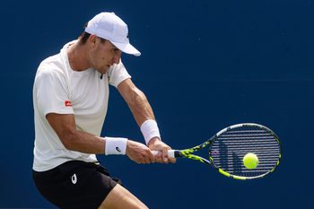 Aug 29, 2025; Flushing, NY, USA; Raphael Collignon of Belgium in action against Jiri Lehecka of Czech Republic in the third round of the menís singles at the US Open at Billie Jean King National Tennis Center. Mandatory Credit: Mike Frey-Imagn Images