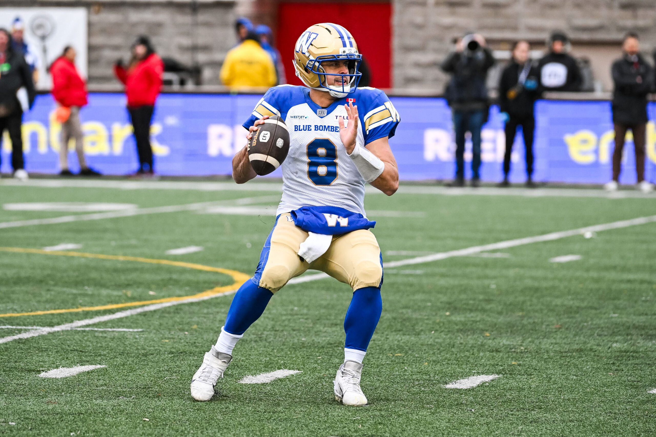 Nov 1, 2025; Montreal, Quebec, Canada; Winnipeg Blue Bombers quarterback Zach Collaros (8) gets ready to pass the ball against the Montreal Alouettes during the third quarter at Percival-Molson stadium. Mandatory Credit: David Kirouac-Imagn Images
