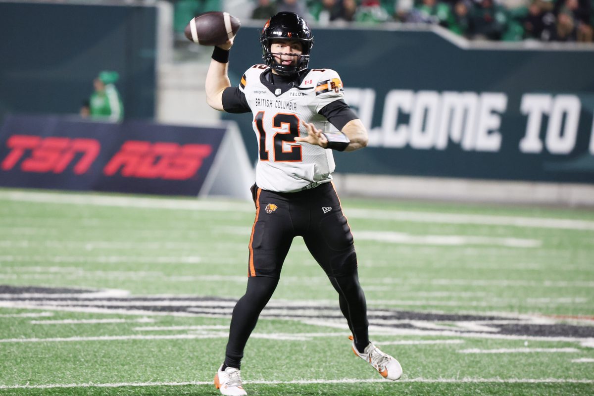 Nov 8, 2025; Regina, Saskatchewan, Canada; BC Lions quarterback Nathan Rourke (12) looks for a receiver downfield during the second half of the CFL Western Conference Final between the BC Lions and the Saskatchewan Roughriders at Mosaic Stadium. Mandatory Credit: Bruce Fedyck-Imagn Images
