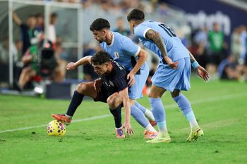 Nov 18, 2025; Tampa, Florida, USA; United States midfielder Sebastian Berhalter (17) controls the ball from Uruguay defender Mathias Olivera (16) in the second half during an international friendly at Raymond James Stadium. Mandatory Credit: Nathan Ray Seebeck-Imagn Images