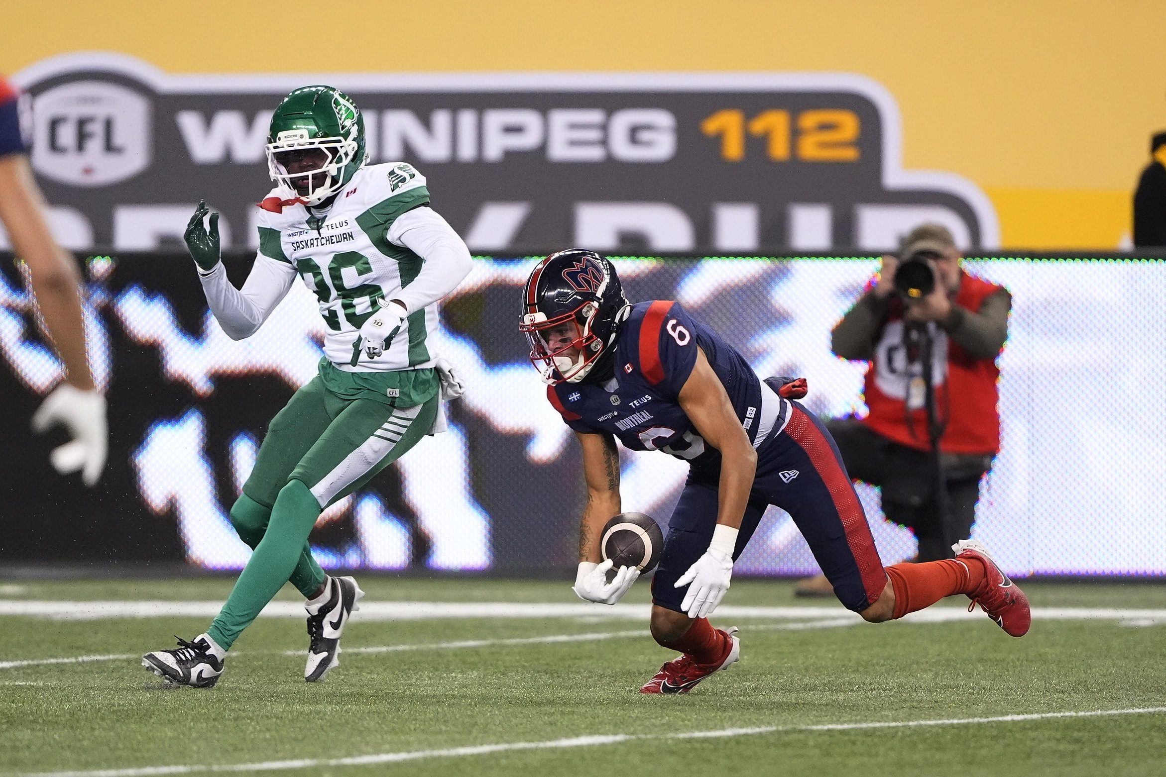 Nov 16, 2025; Winnipeg, Manitoba, Canada; Montreal Alouettes wide receiver Tyson Philpot (6) gets up to run with the ball after a pass reception against Saskatchewan Roughriders defensive back Tevaughn Campbell (26) during the 112th Grey Cup Championship at Princess Auto Stadium. Mandatory Credit: John E. Sokolowski-Imagn Images