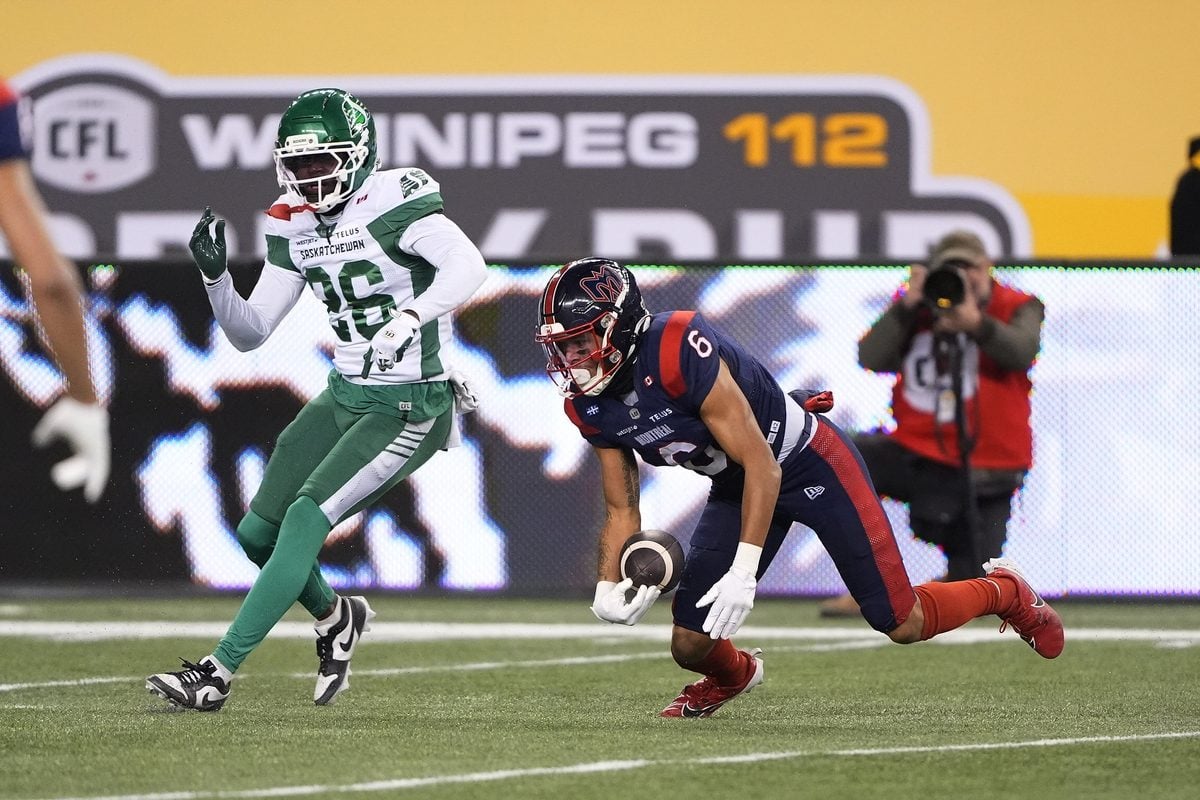 Nov 16, 2025; Winnipeg, Manitoba, Canada; Montreal Alouettes wide receiver Tyson Philpot (6) gets up to run with the ball after a pass reception against Saskatchewan Roughriders defensive back Tevaughn Campbell (26) during the 112th Grey Cup Championship at Princess Auto Stadium. Mandatory Credit: John E. Sokolowski-Imagn Images