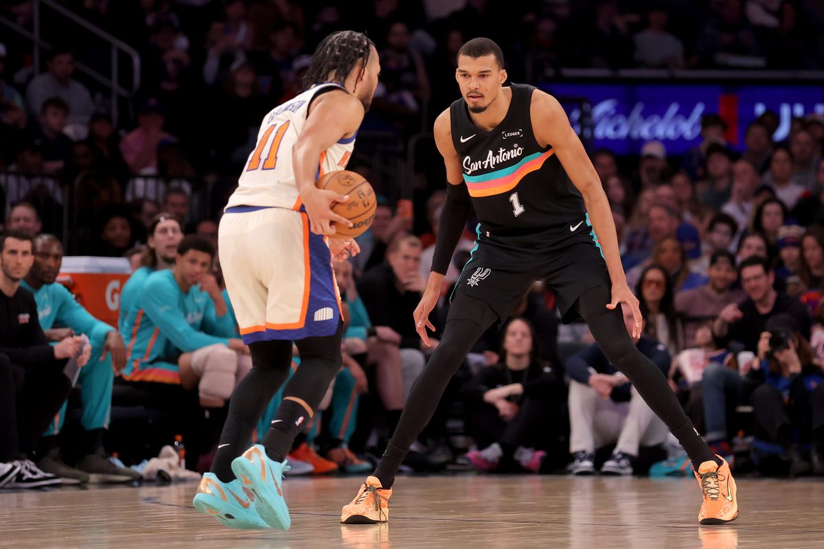 Mar 1, 2026; New York, New York, USA; San Antonio Spurs forward Victor Wembanyama (1) defends New York Knicks guard Jalen Brunson (11) during the third quarter at Madison Square Garden. Mandatory Credit: Brad Penner-Imagn Images