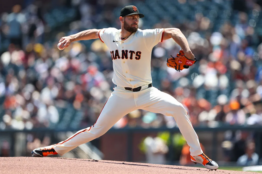 May 6, 2026; San Francisco, California, USA; San Francisco Giants pitcher Adrian Houser (12) throws to a San Diego Padres batter during the first inning at Oracle Park. Mandatory Credit: Scott Marshall-Imagn Images