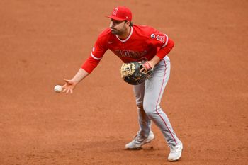 May 12, 2026; Cleveland, Ohio, USA; Los Angeles Angels first baseman Nolan Schanuel (18) tosses the ball to first in the third inning against the Cleveland Guardians at Progressive Field. Mandatory Credit: David Richard-Imagn Images