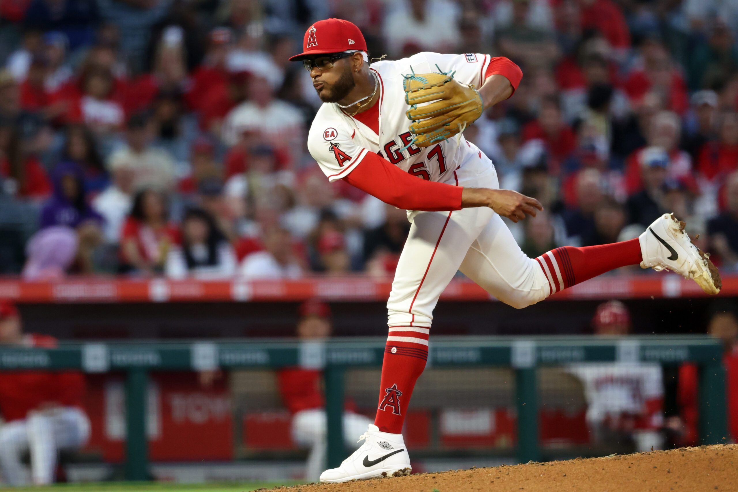 May 23, 2026; Anaheim, California, USA;  Los Angeles Angels pitcher Walbert Urena (57) pitches during the third inning against the Texas Rangers at Angel Stadium. Mandatory Credit: Kiyoshi Mio-Imagn Images