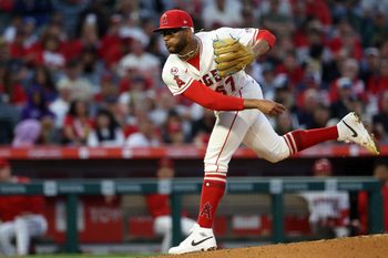 May 23, 2026; Anaheim, California, USA;  Los Angeles Angels pitcher Walbert Urena (57) pitches during the third inning against the Texas Rangers at Angel Stadium. Mandatory Credit: Kiyoshi Mio-Imagn Images