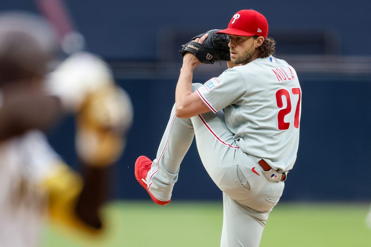 May 26, 2026; San Diego, California, USA; Philadelphia Phillies starting pitcher Aaron Nola (27) throws a pitch during the first inning against the San Diego Padres at Petco Park. Mandatory Credit: David Frerker-Imagn Images