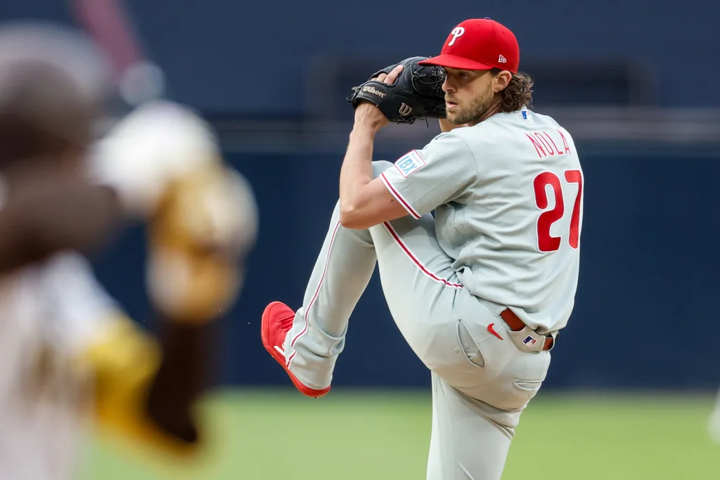 May 26, 2026; San Diego, California, USA; Philadelphia Phillies starting pitcher Aaron Nola (27) throws a pitch during the first inning against the San Diego Padres at Petco Park. Mandatory Credit: David Frerker-Imagn Images