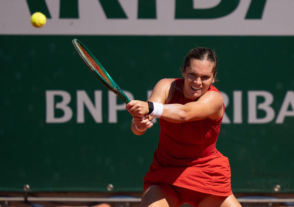 May 27, 2026; Paris, France; Caty McNally of the United States returns a shot during her match against Belinda Bencic of Switzerland on day four at Stade Roland Garros. Mandatory Credit: Susan Mullane-Imagn Images