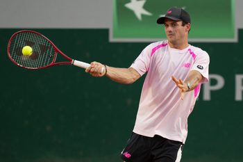 May 27, 2026; Paris, France; Tommy Paul of the United States returns a shot during his match against Lorenzo Musetti of Italy on day four at Stade Roland Garros. Mandatory Credit: Susan Mullane-Imagn Images