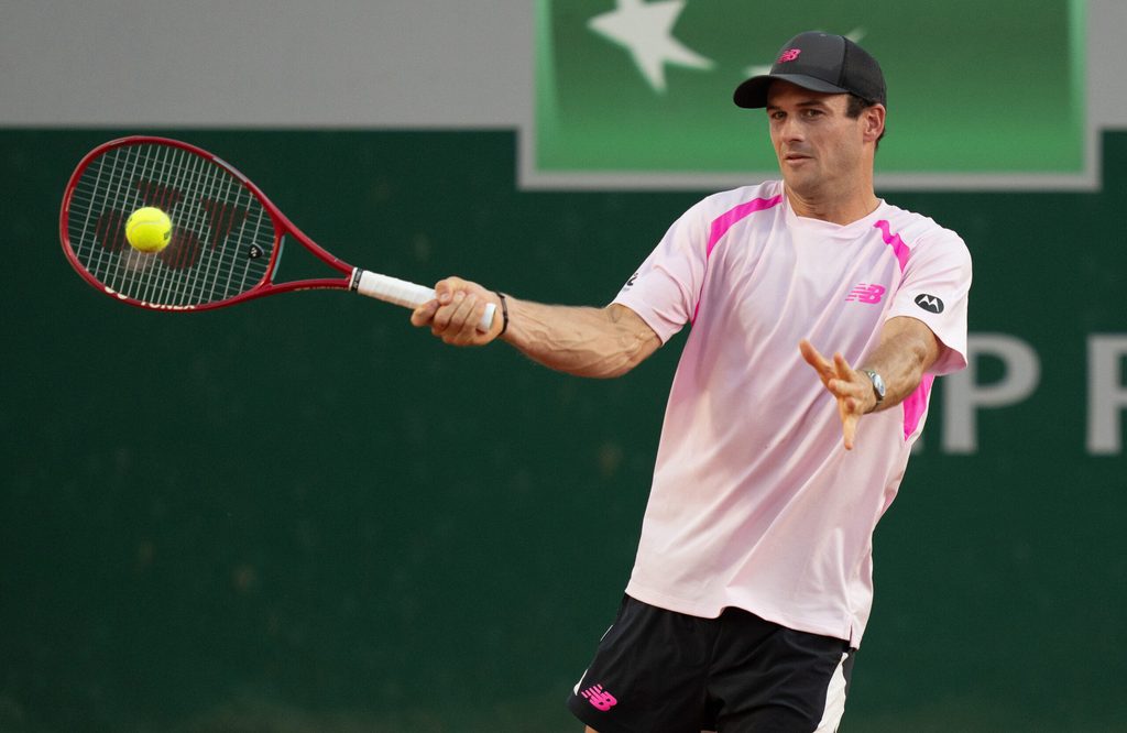 May 27, 2026; Paris, France; Tommy Paul of the United States returns a shot during his match against Lorenzo Musetti of Italy on day four at Stade Roland Garros. Mandatory Credit: Susan Mullane-Imagn Images