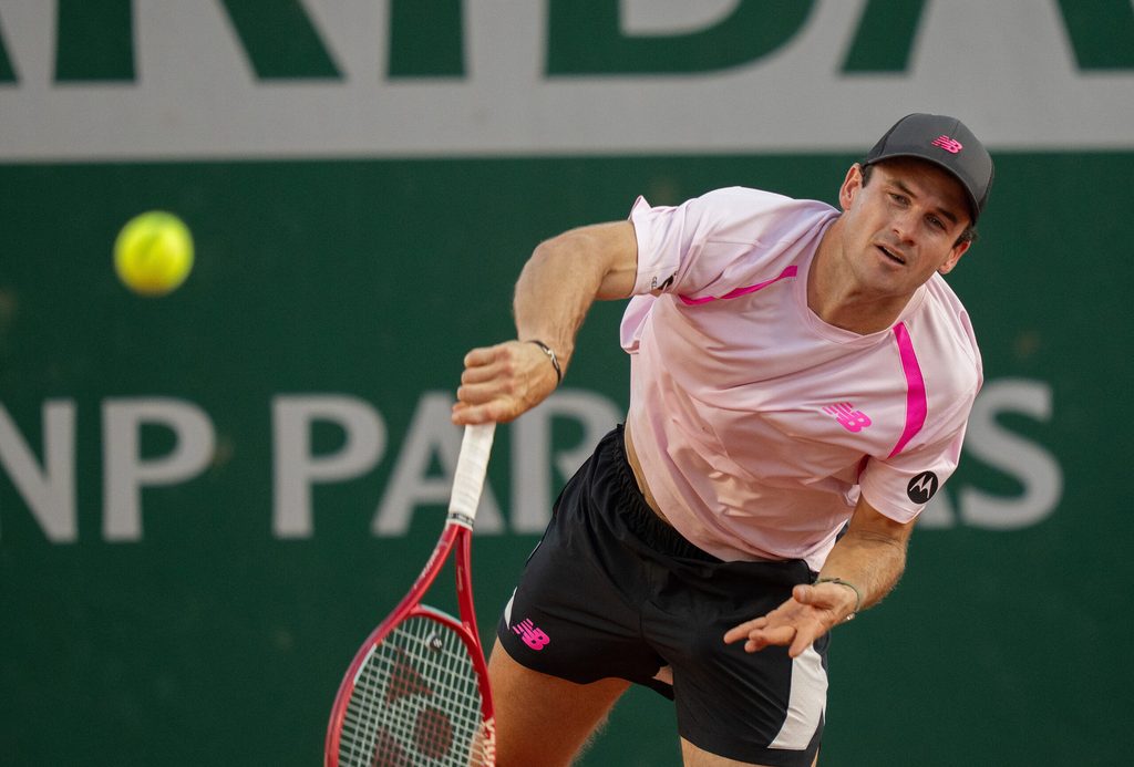 May 27, 2026; Paris, France; Tommy Paul of the United States serves during his match against Lorenzo Musetti of Italy on day four at Stade Roland Garros. Mandatory Credit: Susan Mullane-Imagn Images