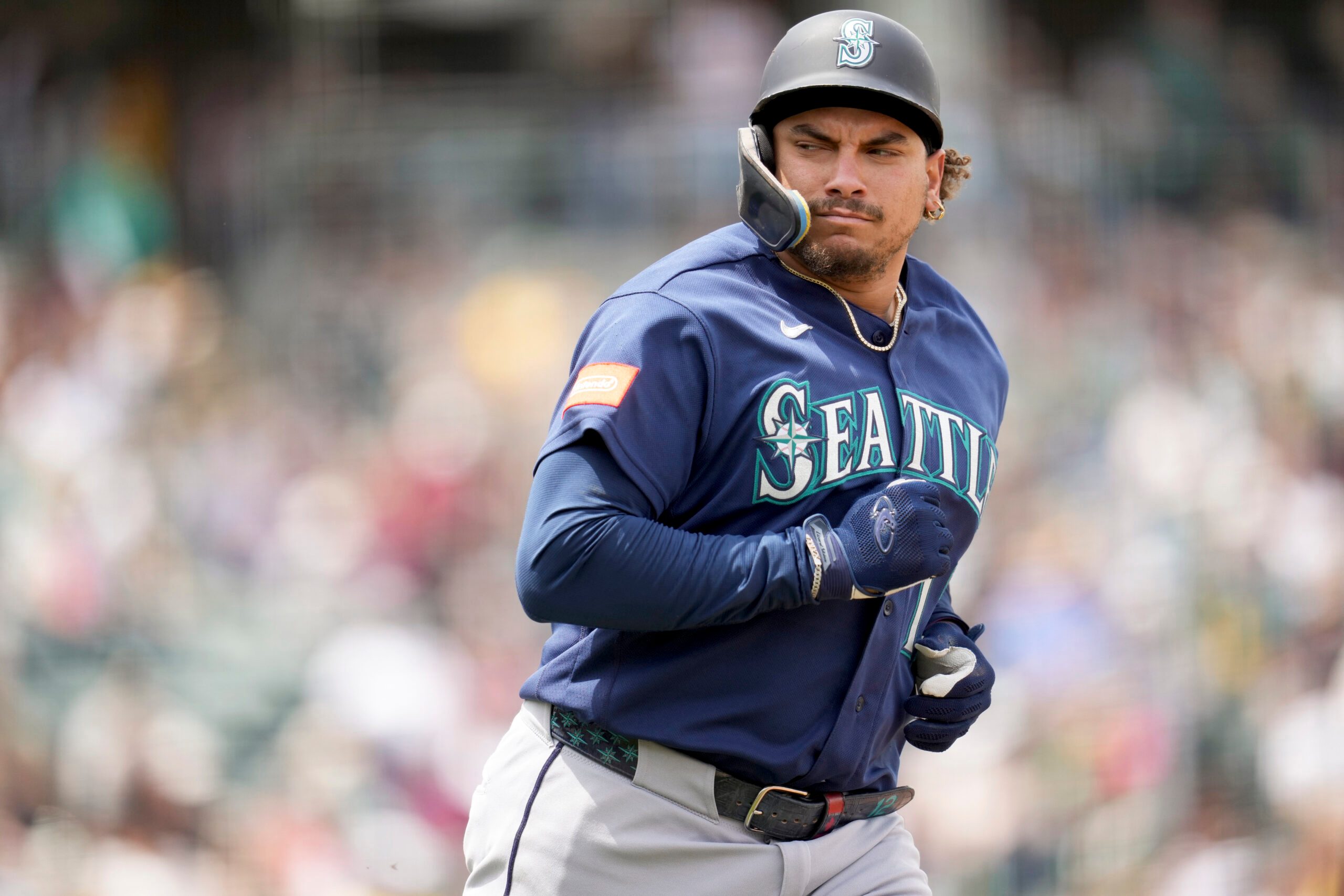 May 27, 2026; West Sacramento, California, USA; Seattle Mariners first baseman Josh Naylor (12) looks towards the dugout after hitting a single against the Athletics in the seventh inning at Sutter Health Park. Mandatory Credit: Cary Edmondson-Imagn Images