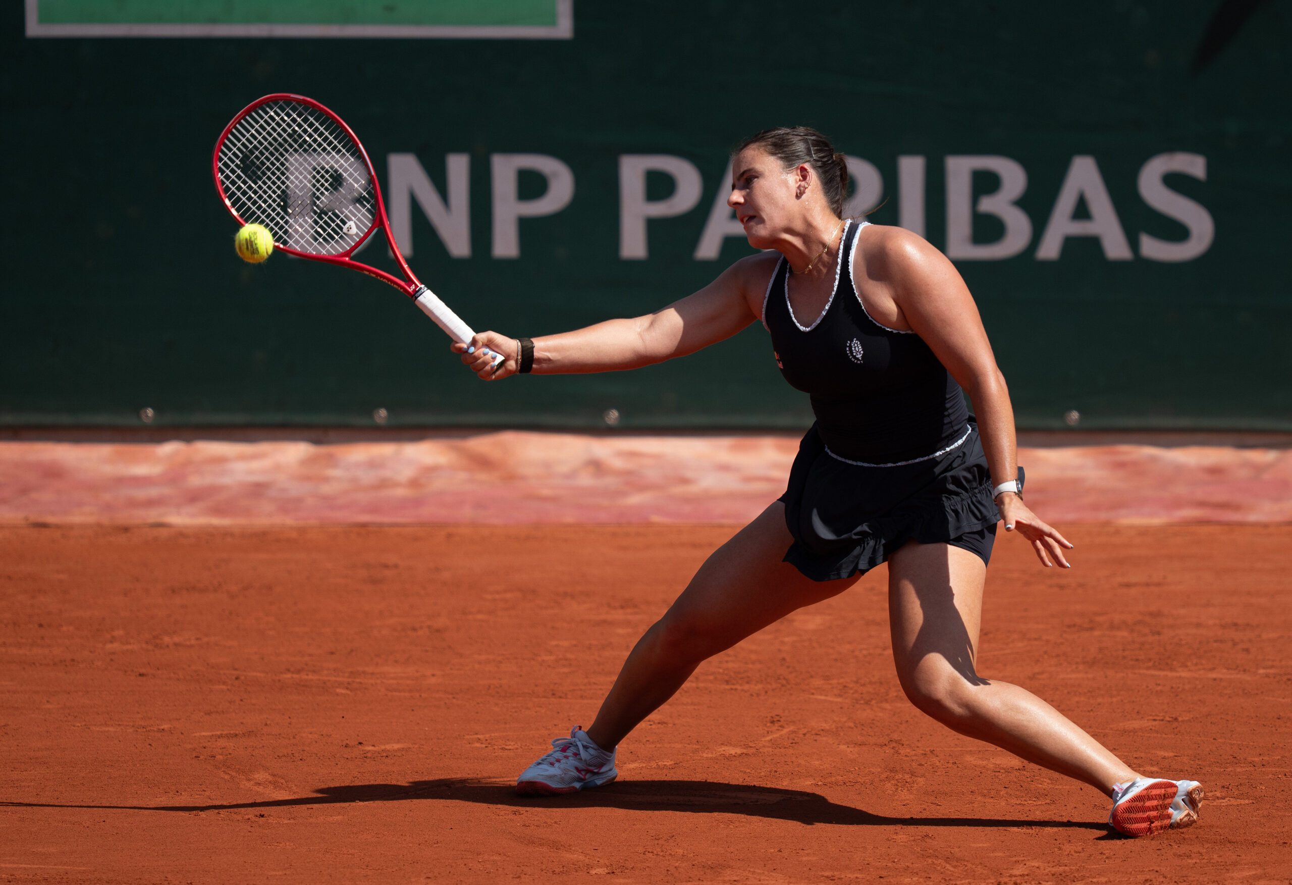 May 28, 2026; Paris, France; Emma Navarro of the United States returns a shot during her match against Iva Jovic of the United States on day five at Stade Roland Garros. Mandatory Credit: Susan Mullane-Imagn Images