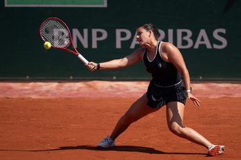 May 28, 2026; Paris, France; Emma Navarro of the United States returns a shot during her match against Iva Jovic of the United States on day five at Stade Roland Garros. Mandatory Credit: Susan Mullane-Imagn Images