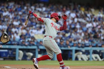 May 30, 2026; Los Angeles, California, USA; Philadelphia Phillies designated hitter Kyle Schwarber (12) strikes out against the Los Angeles Dodgers during the first inning at Dodger Stadium. Mandatory Credit: Kiyoshi Mio-Imagn Images