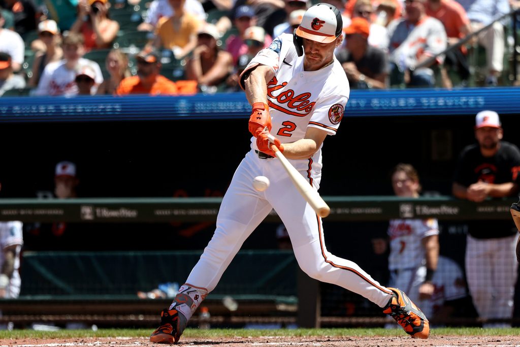 May 31, 2026; Baltimore, Maryland, USA; Baltimore Orioles shortstop Gunnar Henderson (2) hits an RBI double during the sixth inning against the Toronto Blue Jays at Oriole Park at Camden Yards. Mandatory Credit: Daniel Kucin Jr.-Imagn Images