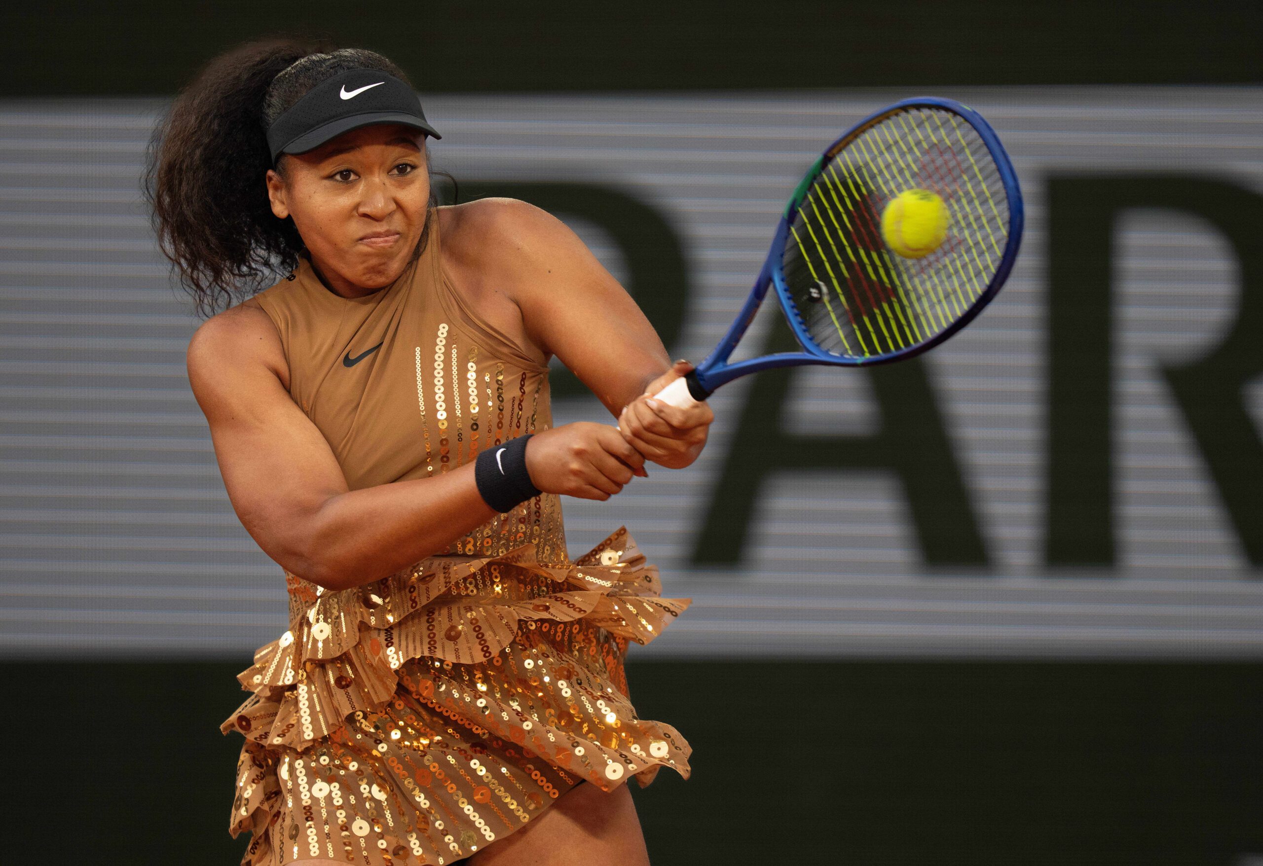 Jun 1, 2026; Paris, France;  Naomi Osaka of Japan returns a shot during her match against Aryna Sabalenka on day nine at Stade Roland Garros. Mandatory Credit: Susan Mullane-Imagn Images