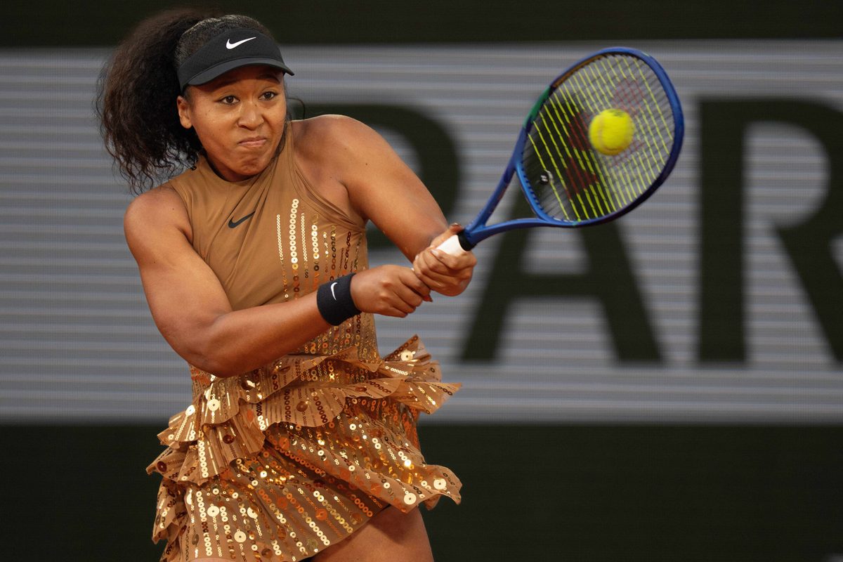 Jun 1, 2026; Paris, France;  Naomi Osaka of Japan returns a shot during her match against Aryna Sabalenka on day nine at Stade Roland Garros. Mandatory Credit: Susan Mullane-Imagn Images