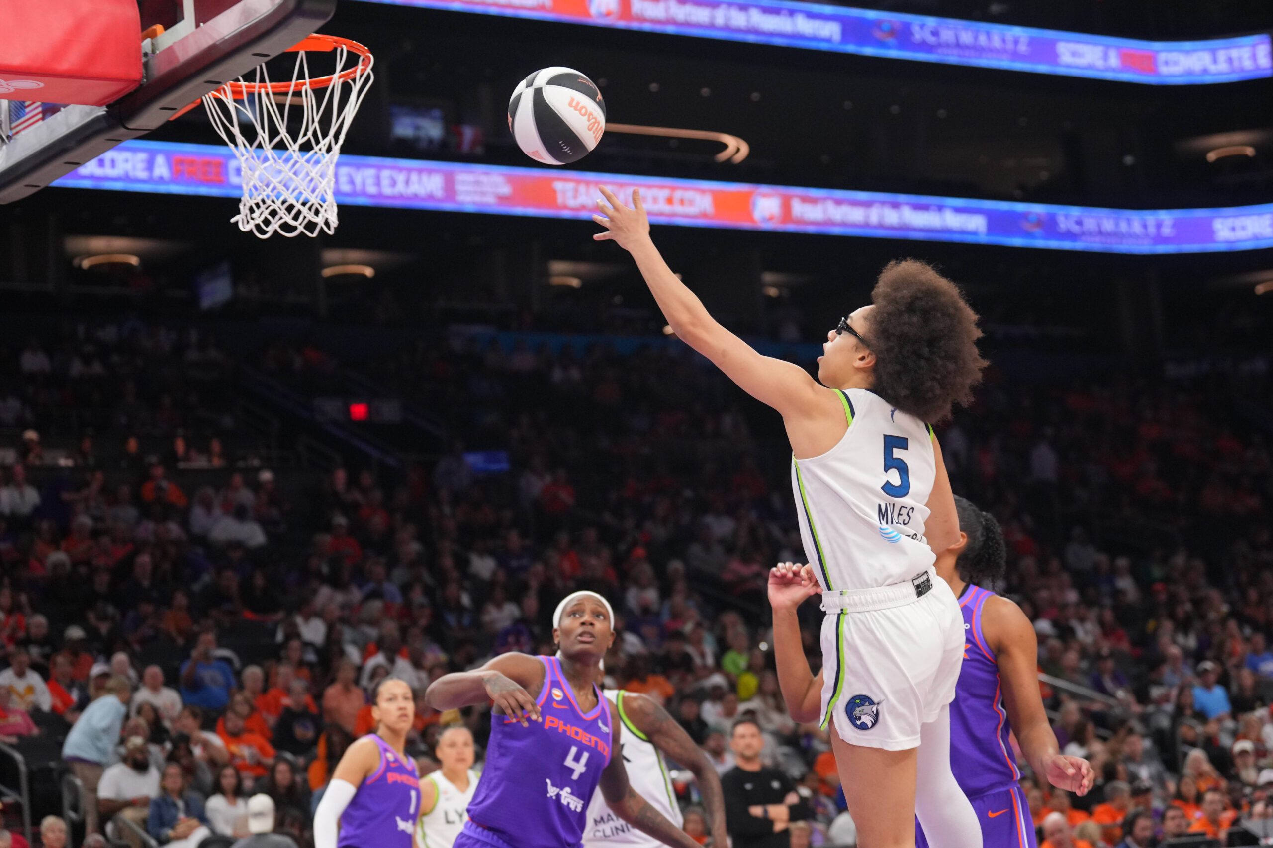 Jun 1, 2026; Phoenix, Arizona, USA; Minnesota Lynx guard Olivia Miles (5) shoots against the Phoenix Mercury during the second half at Mortgage Matchup Center. Mandatory Credit: Joe Camporeale-Imagn Images