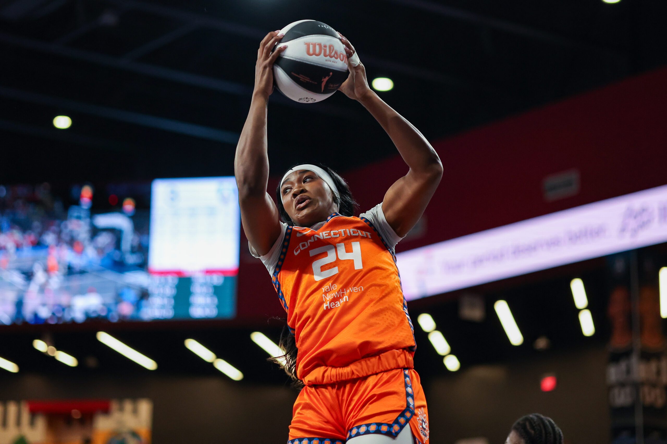 Jun 2, 2026; College Park, Georgia, USA; Connecticut Sun forward Aneesah Morrow (24) grabs a rebound against the Atlanta Dream in the first quarter at Gateway Center Arena at College Park. Mandatory Credit: Brett Davis-Imagn Images