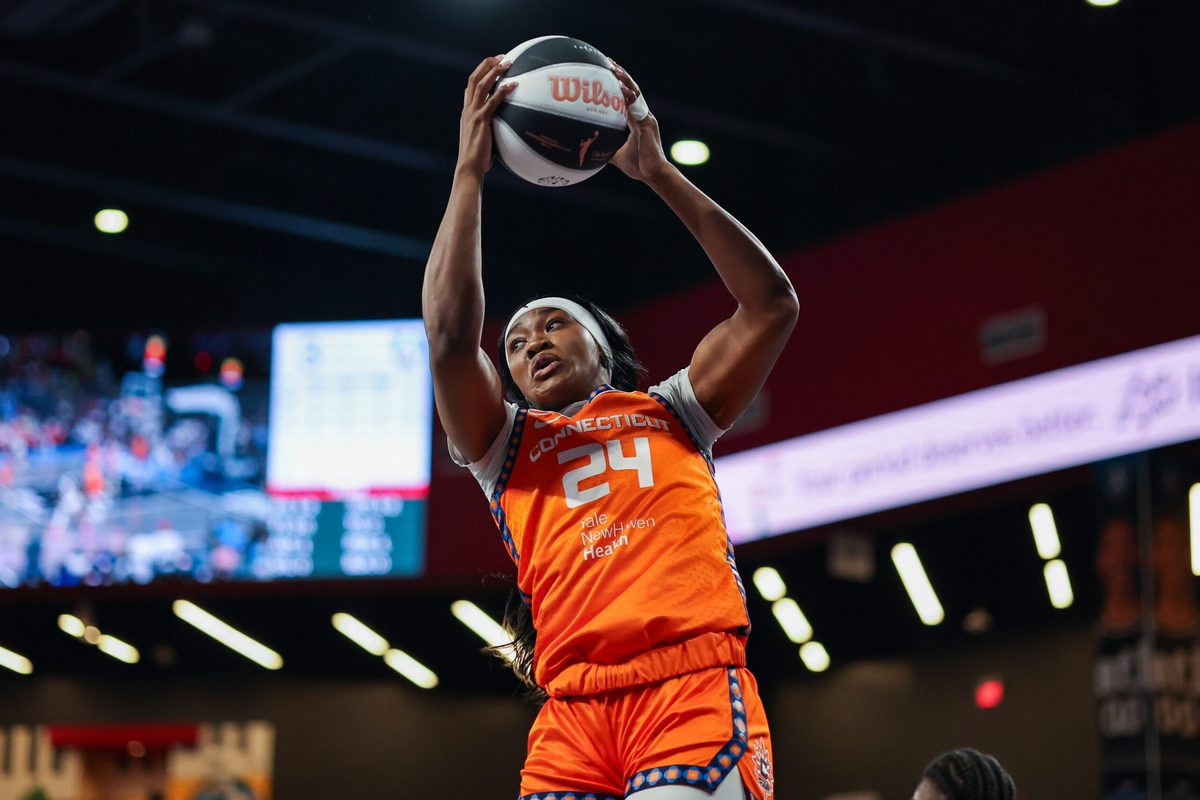 Jun 2, 2026; College Park, Georgia, USA; Connecticut Sun forward Aneesah Morrow (24) grabs a rebound against the Atlanta Dream in the first quarter at Gateway Center Arena at College Park. Mandatory Credit: Brett Davis-Imagn Images