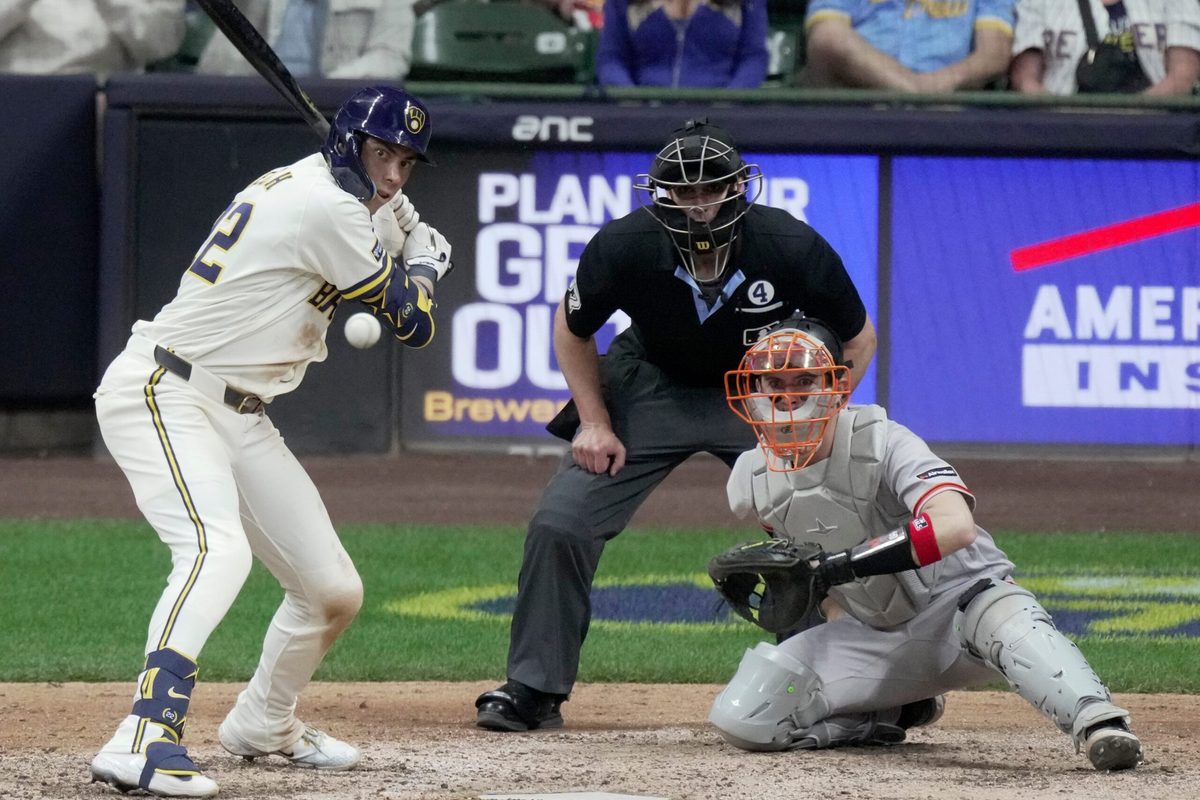 Milwaukee Brewers designated hitter Christian Yelich (22) hits a two-run single during the eighth inning of their game against the San Francisco Giants Tuesday, June 2, 2026 at American Family Field in Milwaukee, Wisconsin.