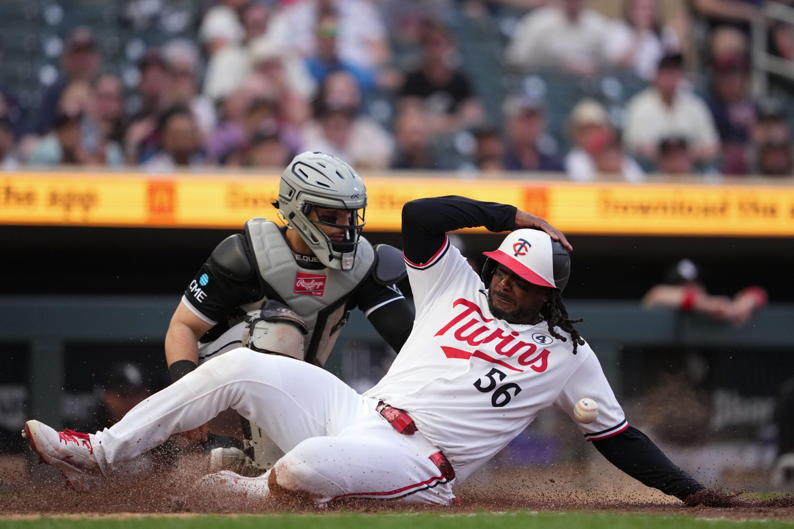 Jun 2, 2026; Minneapolis, Minnesota, USA; Minnesota Twins designated hitter Josh Bell (56) scores during the sixth inning against the Chicago White Sox at Target Field. Mandatory Credit: Jordan Johnson-Imagn Images