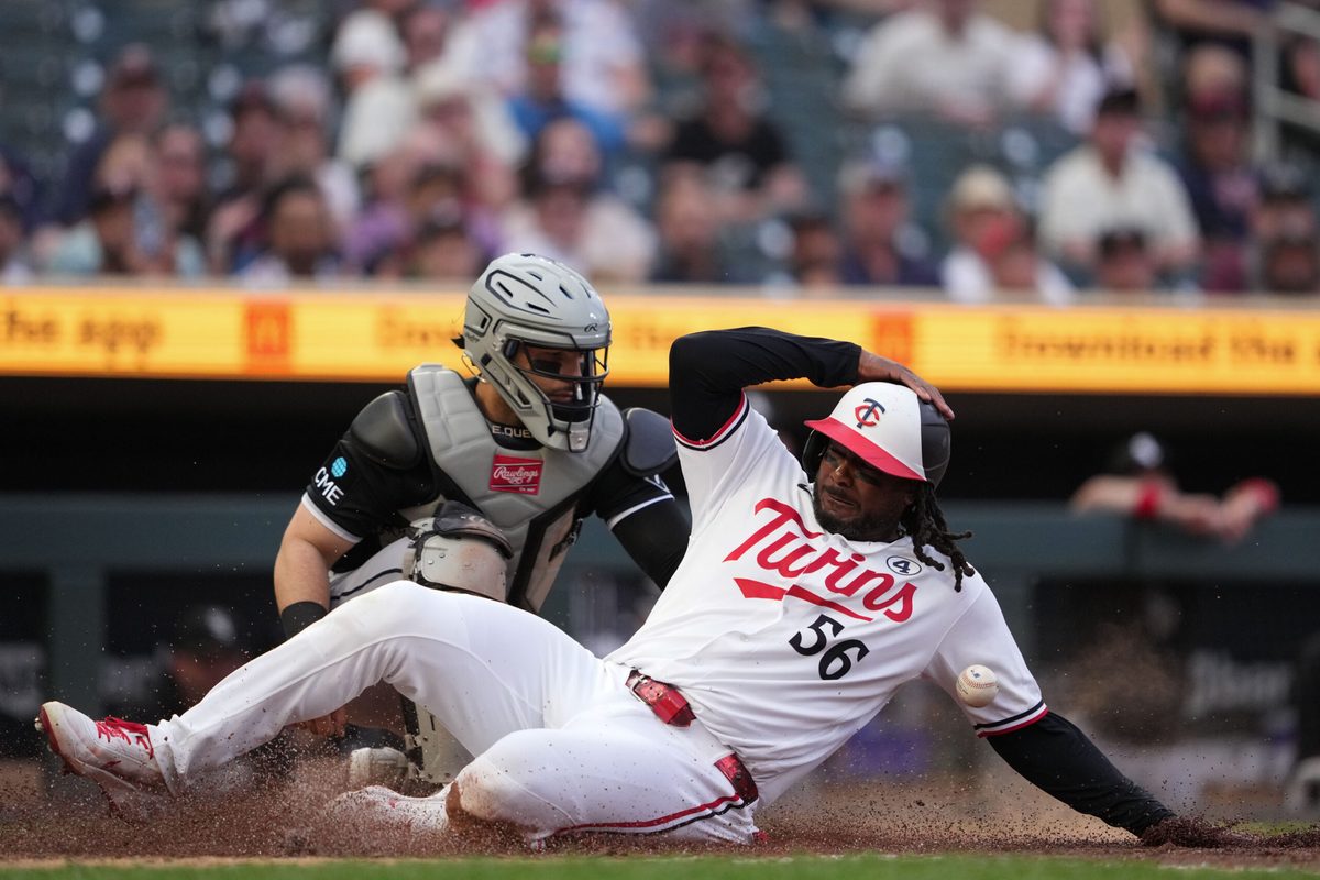 Jun 2, 2026; Minneapolis, Minnesota, USA; Minnesota Twins designated hitter Josh Bell (56) scores during the sixth inning against the Chicago White Sox at Target Field. Mandatory Credit: Jordan Johnson-Imagn Images