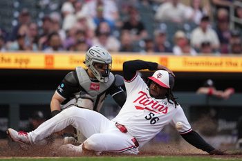 Jun 2, 2026; Minneapolis, Minnesota, USA; Minnesota Twins designated hitter Josh Bell (56) scores during the sixth inning against the Chicago White Sox at Target Field. Mandatory Credit: Jordan Johnson-Imagn Images