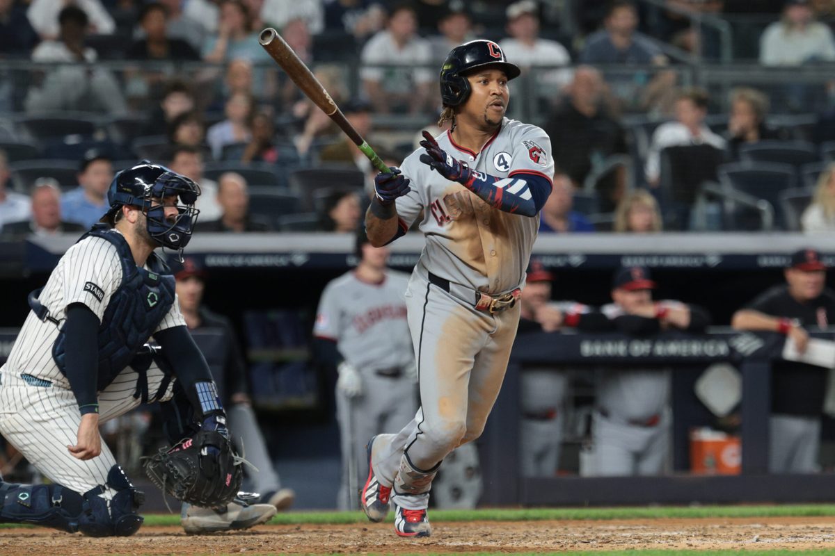 Jun 2, 2026; Bronx, New York, USA; Cleveland Guardians third baseman Jose Ramirez (11) hits an RBI double during the seventh inning against the New York Yankees at Yankee Stadium. Mandatory Credit: Vincent Carchietta-Imagn Images