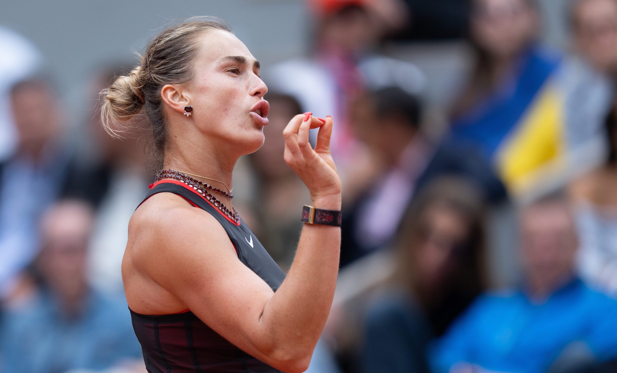 Jun 3, 2026; Paris, France; Aryna Sabalenka reacts during her match against Diana Shnaider on day 11 at Stade Roland Garros. Mandatory Credit: Susan Mullane-Imagn Images