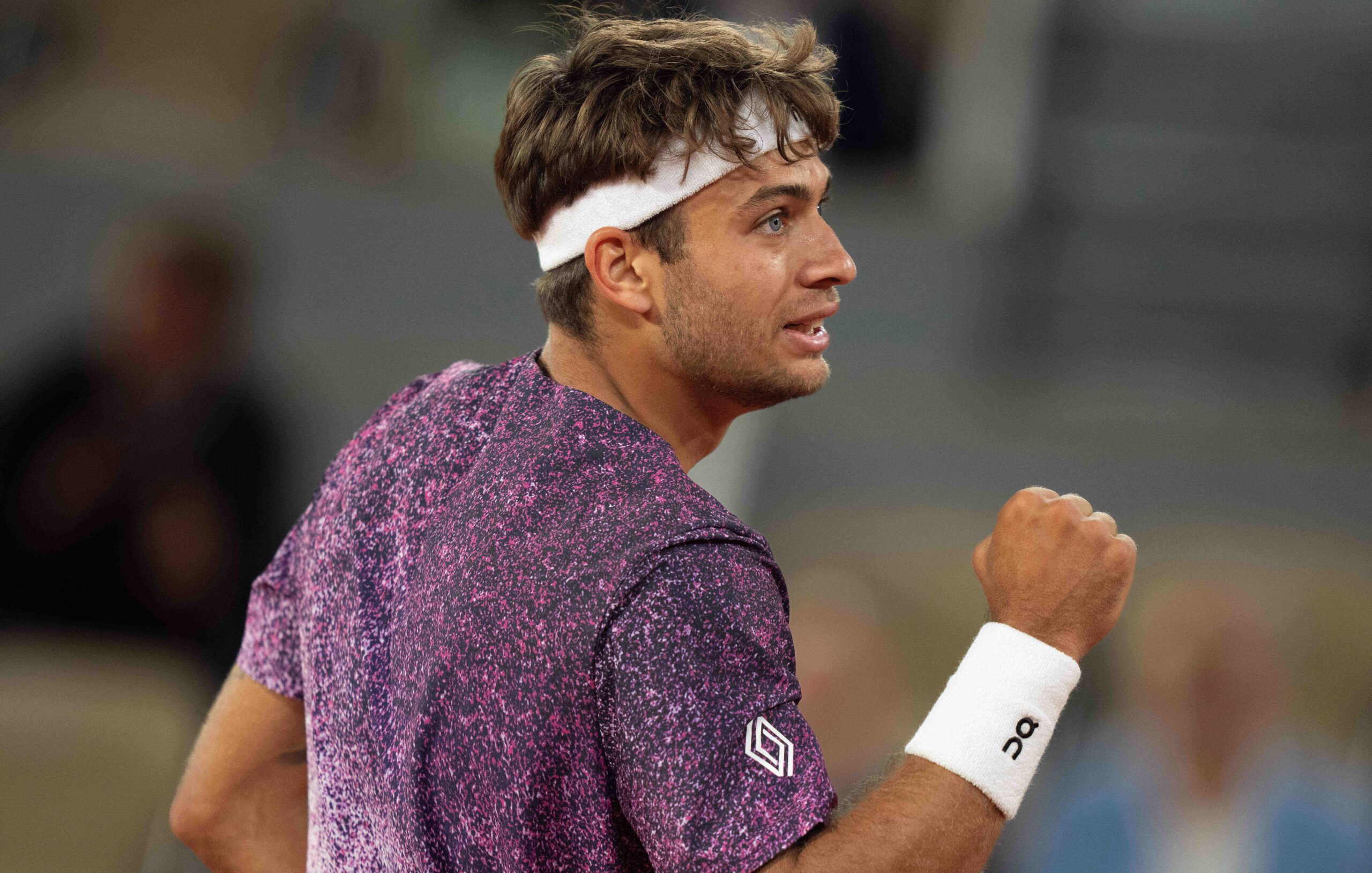 Jun 3, 2026; Paris, France; Flavio Cobolli of Italy reacts during his match against Felix Auger-Aliassime of Canada on day 11 at Stade Roland Garros. Mandatory Credit: Susan Mullane-Imagn Images