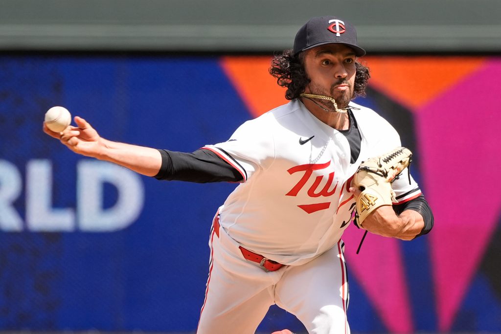 Jun 3, 2026; Minneapolis, Minnesota, USA; Minnesota Twins relief pitcher Justin Lawrence throws to the Chicago White Sox in the ninth inning at Target Field. Mandatory Credit: Bruce Kluckhohn-Imagn Images