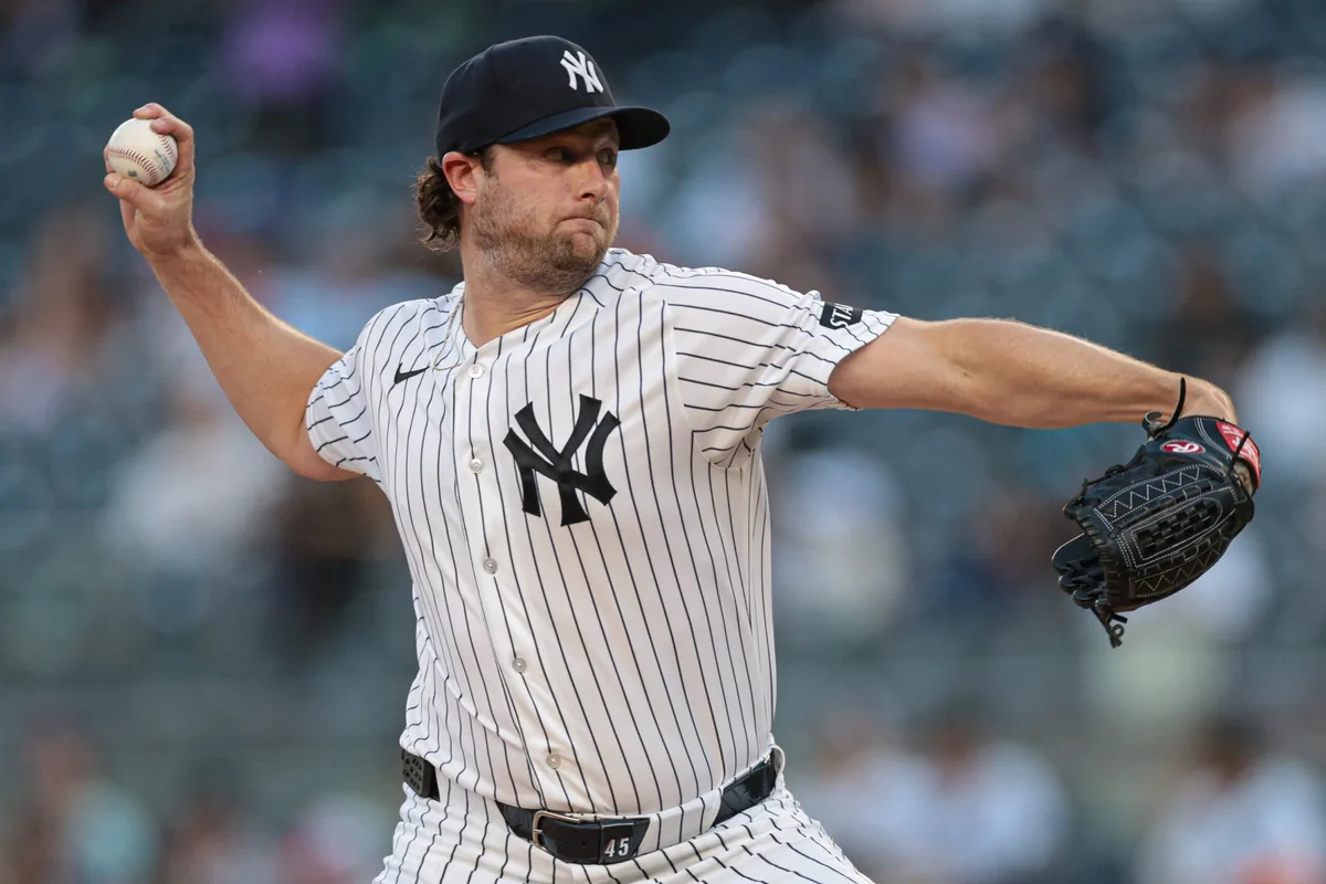 Jun 3, 2026; Bronx, New York, USA; New York Yankees pitcher Gerrit Cole (45) delivers a pitch during the first inning against the Cleveland Guardians at Yankee Stadium. Mandatory Credit: Vincent Carchietta-Imagn Images