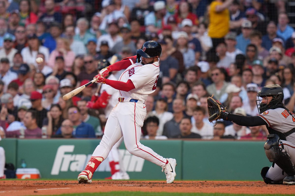 Jun 3, 2026; Boston, Massachusetts, USA; Boston Red Sox right fielder Wilyer Abreu (52) hits a two run home run against the Baltimore Orioles in the third inning at Fenway Park. Mandatory Credit: David Butler II-Imagn Images