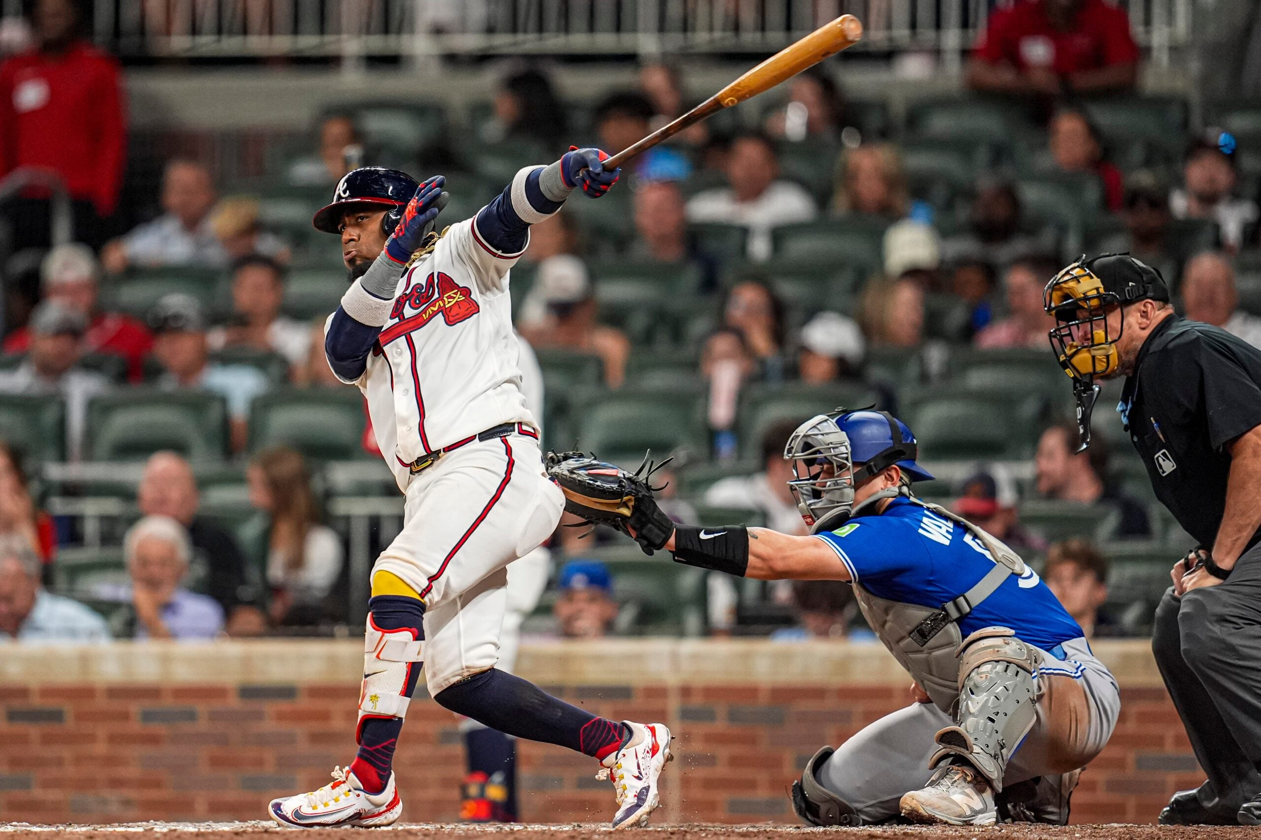 Jun 3, 2026; Cumberland, Georgia, USA; Atlanta Braves second baseman Ozzie Albies (1) hits a three run home run against the Toronto Blue Jays during the seventh inning at Truist Park. Mandatory Credit: Dale Zanine-Imagn Images