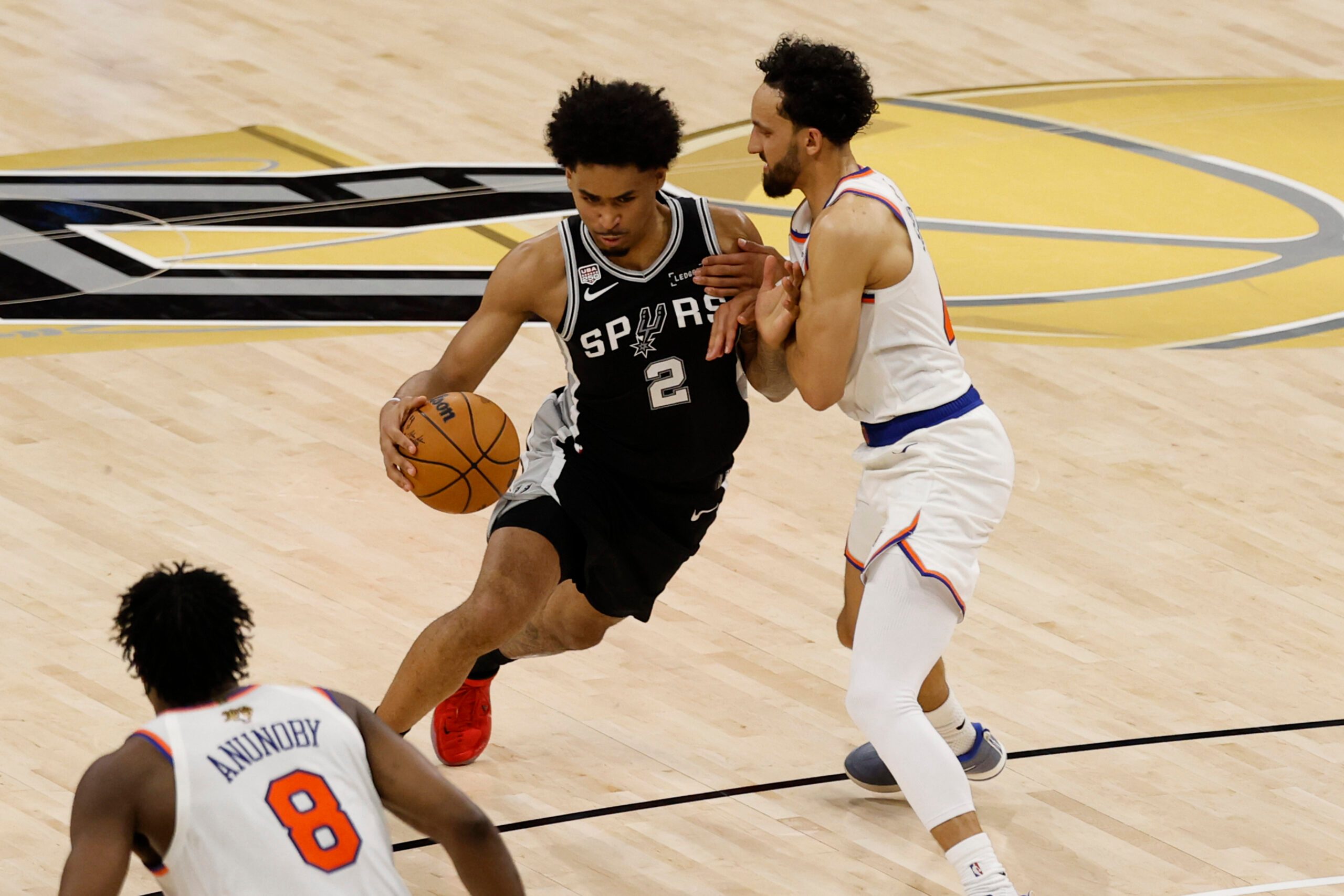 Jun 3, 2026; San Antonio, Texas, USA; San Antonio Spurs guard Dylan Harper (2) dribbles the ball against the New York Knicks in the second half during game one of the 2026 NBA Finals at Frost Bank Center. Mandatory Credit: Geoff Burke-Imagn Images