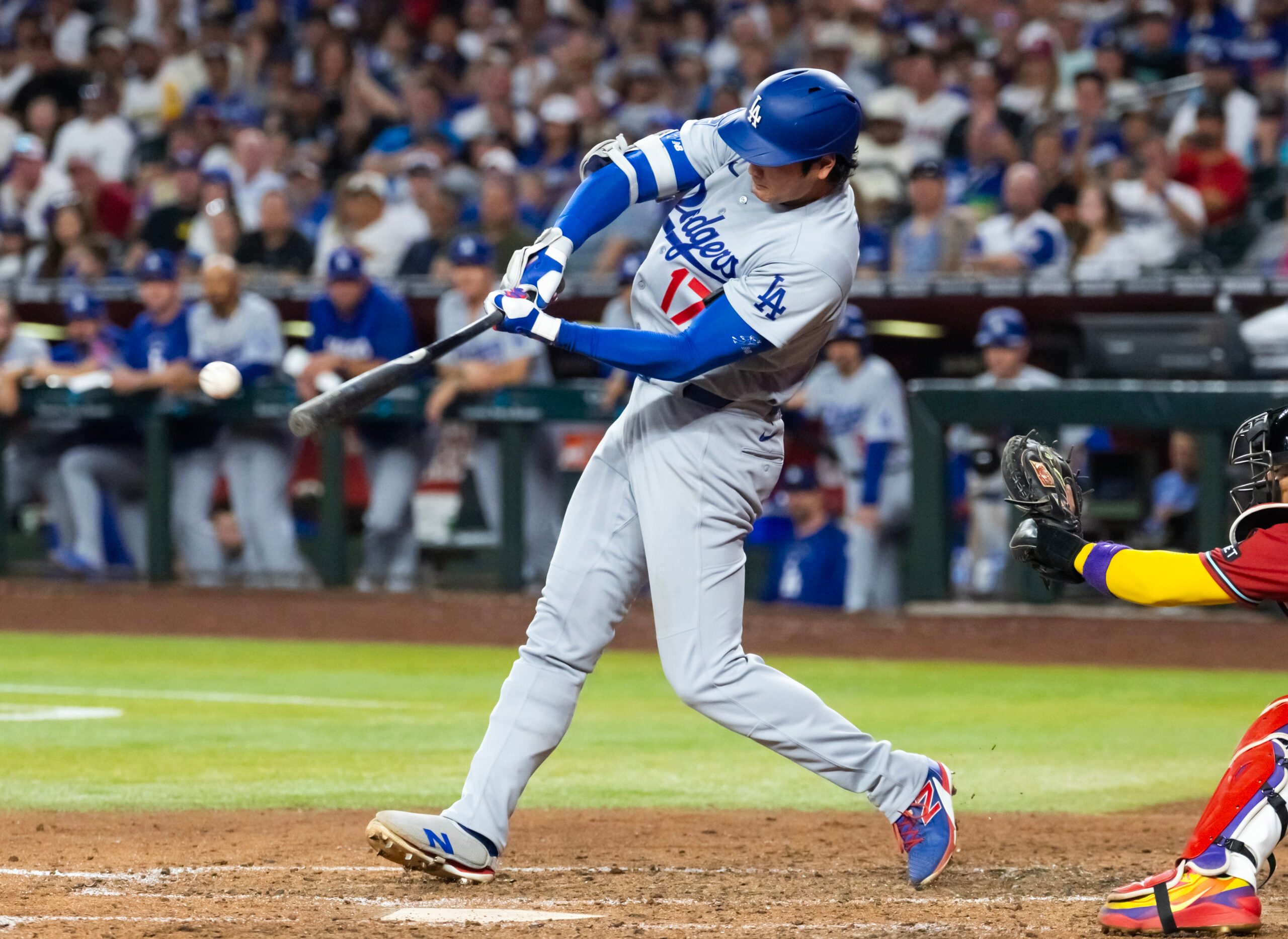 Jun 3, 2026; Phoenix, Arizona, USA; Los Angeles Dodgers designated hitter Shohei Ohtani hits a single in the fifth inning against the Arizona Diamondbacks at Chase Field. Mandatory Credit: Mark J. Rebilas-Imagn Images